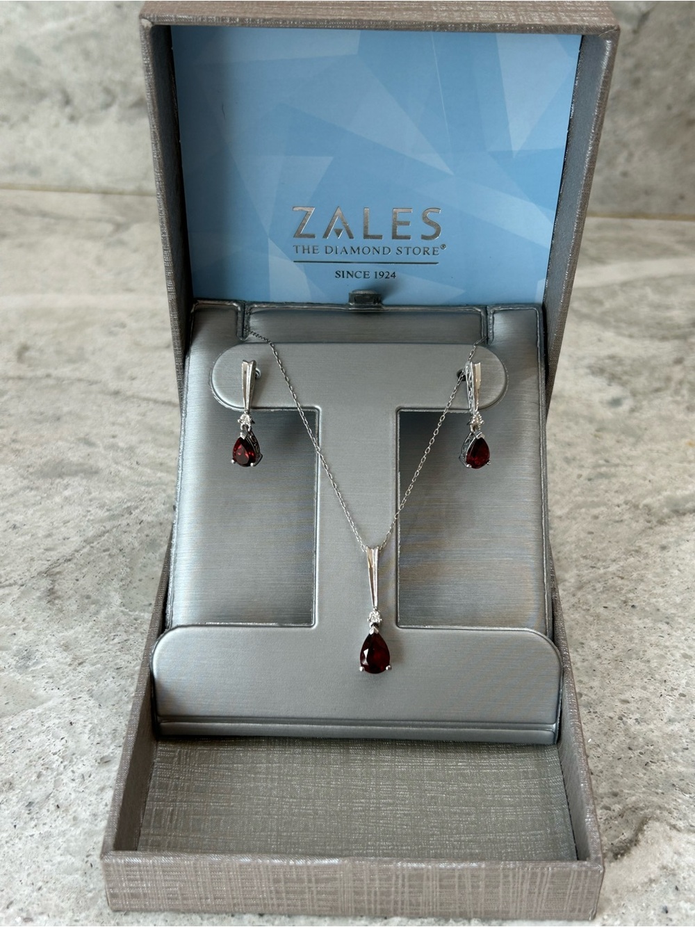 Pear-Shaped Garnet and Diamond
Accent Pendant & Earrings Set in Sterling Silver